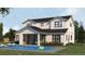 Beautiful backyard with a swimming pool, patio, outdoor kitchen, and a black metal roof at 2502 Bethaway Ave, Orlando, FL 32806