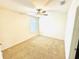 Bedroom with carpet, window, and a ceiling fan at 2837 Palatino Lane, Tavares, FL 32778