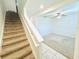 Bright entryway featuring a staircase and an open view into the living area at 2837 Palatino Lane, Tavares, FL 32778