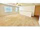 Large living room with carpet and natural light at 2837 Palatino Lane, Tavares, FL 32778
