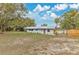 Waterfront property with fresh paint and an inviting yard plus a new fence offers both privacy and curb appeal at 2980 E Central Ave, Bartow, FL 33830