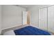 Bedroom with gray carpet, door with patterned carpet, and window at 3069 Cassidy Ln, Haines City, FL 33844