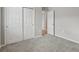 Bright bedroom with neutral carpet and white base molding. Features a closet at 3069 Cassidy Ln, Haines City, FL 33844