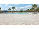 Enjoy a refreshing swim in the community pool with ample lounge space and mature landscaping at 3069 Cassidy Ln, Haines City, FL 33844
