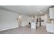 Modern kitchen with stainless steel appliances, center island with seating, and open layout at 3069 Cassidy Ln, Haines City, FL 33844
