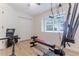 Gym with exercise equipment and a bright window at 3111 Indian Trl, Eustis, FL 32726