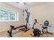 This room is furnished with weights and exercise equipment and has a view of the lawn at 3111 Indian Trl, Eustis, FL 32726