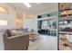 Bright living room featuring large windows, a sliding glass door to patio, and modern shelving at 3111 Indian Trl, Eustis, FL 32726
