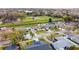 A neighborhood aerial view of a subdivision with lush green landscaping and varied home styles at 3117 Shady Pine Ave, Winter Park, FL 32792