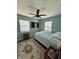 Cozy bedroom with a ceiling fan and plenty of natural light at 3117 Shady Pine Ave, Winter Park, FL 32792