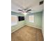 Bedroom featuring neutral walls, carpet and a ceiling fan at 3117 Shady Pine Ave, Winter Park, FL 32792