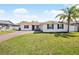 Charming single-story home with a well-maintained lawn, brick driveway, and a welcoming front porch at 3117 Shady Pine Ave, Winter Park, FL 32792