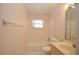 The bathroom has a tub and shower combo, vanity, and decorated wall paper at 380 Banyan Dr, Maitland, FL 32751