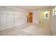 Spacious bedroom with a closet and attached bathroom featuring a vanity and toilet at 380 Banyan Dr, Maitland, FL 32751
