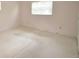 Cozy bedroom with a window bringing natural light into the space at 380 Banyan Dr, Maitland, FL 32751