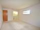 Bedroom with a large window that provides natural light at 380 Banyan Dr, Maitland, FL 32751