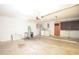 Well-lit garage featuring storage and a utility area at 380 Banyan Dr, Maitland, FL 32751