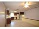 Eat-in kitchen features tile flooring, wooden cabinetry, and a ceiling fan for added comfort at 380 Banyan Dr, Maitland, FL 32751