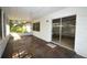 The tiled patio offers a shaded seating area and screened enclosure at 380 Banyan Dr, Maitland, FL 32751