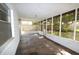 Open air patio with slate flooring and views of the backyard at 380 Banyan Dr, Maitland, FL 32751