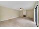 Large living room with plush carpeting, ceiling fan, and a decorative fireplace at 4036 Shannon Brown Dr, Orlando, FL 32808