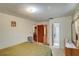 Bright bedroom with neutral walls, double mirrored closet, and a tiled floor at 4155 Westgate Rd, Orlando, FL 32808