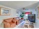 Comfortable living room with cozy furniture, tile flooring, and decor accents for relaxed living at 4155 Westgate Rd, Orlando, FL 32808