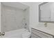 Updated bathroom with new vanity, modern fixtures, and tiled shower/tub combo at 4536 San Sebastian Cir, Orlando, FL 32808