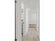 Bright hallway with marble floors leads to rooms with natural light and modern finishes at 4536 San Sebastian Cir, Orlando, FL 32808