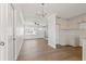 Open floor plan featuring new floors and fresh paint throughout the home at 4536 San Sebastian Cir, Orlando, FL 32808