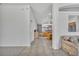 Hallway view into an open-concept kitchen with stainless steel appliances at 4912 Culdesac Ct, St Cloud, FL 34772