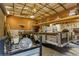Large workshop interior with a utility trailer and high ceilings, ideal for projects and storage at 5117 Cr 316A, Bushnell, FL 33513