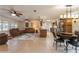 Open living area featuring tile floors, ceiling fans, and windows that provide lots of natural light at 5117 Cr 316A, Bushnell, FL 33513