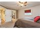 Relaxing bedroom featuring a window with blinds, carpet floors, and a neutral wall color at 5117 Cr 316A, Bushnell, FL 33513