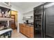 Walk-in pantry provides ample storage with lots of shelving, cabinets, countertop, and refrigerator at 5117 Cr 316A, Bushnell, FL 33513