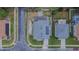 An overhead view of a home with solar panels, a backyard patio, and landscaped lawn at 523 Cascading Creek Ln, Winter Garden, FL 34787