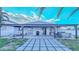 Inviting backyard with pergola, custom patio and manicured lawn perfect for outdoor living at 523 Cascading Creek Ln, Winter Garden, FL 34787