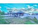 Inviting backyard with pergola, custom patio and manicured lawn perfect for outdoor living at 523 Cascading Creek Ln, Winter Garden, FL 34787