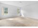 Bright bedroom boasts carpeted floors and windows allowing natural light at 536 Kilimanjaro Dr, Kissimmee, FL 34758