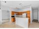 Kitchen features breakfast bar, stainless appliances, and tile floors at 536 Kilimanjaro Dr, Kissimmee, FL 34758