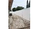 Fenced backyard featuring a gravel area, providing privacy and low-maintenance landscaping at 5371 Tribune Dr, Orlando, FL 32812