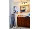 Bathroom featuring a wood vanity with a mirror and ample counter space, perfect for getting ready at 5371 Tribune Dr, Orlando, FL 32812