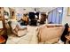 Cozy living room features tile floors, a fireplace, and recliner chairs for comfortable gathering at 5371 Tribune Dr, Orlando, FL 32812