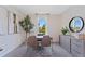 Serene home office with modern decor, natural light, and comfortable seating at 5852 Galloping Dr, Apopka, FL 32712