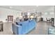Spacious open-concept living room with contemporary furniture and decor at 6105 Citrus Grove Ct, St Cloud, FL 34771