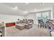 Bright living room features a comfortable couch, and table with chairs at 6105 Citrus Grove Ct, St Cloud, FL 34771