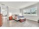 Well-lit main bedroom with a large window offering natural light at 6105 Citrus Grove Ct, St Cloud, FL 34771