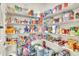 Well-stocked walk-in pantry with ample shelving and storage space at 6105 Citrus Grove Ct, St Cloud, FL 34771