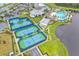 Aerial view of the tennis courts, a pool, and clubhouse amenities in this active adult community, set by a scenic lake at 6105 Citrus Grove Ct, St Cloud, FL 34771