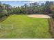 Large grassy field with baseball diamond and soccer goals, perfect for outdoor activities at 743 Riverbend Blvd, Longwood, FL 32779
